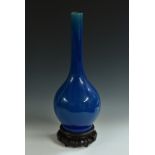 A Japanese Awaji monochrome bottle vase, crackle glazed in mottled tones of turquoise, 47cm high,