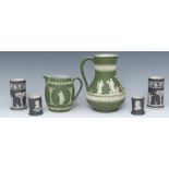 A Wedgwood green baluster jug, typically sprigged in white with classical figures, 18cm high,