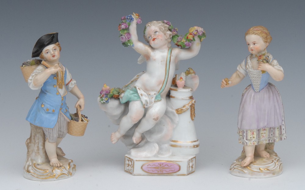 A pair of Meissen figures, The Flower Seller and The Vinter,