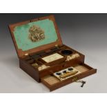 A George III mahogany rectangular artist's box, hinged cover enclosing colours and paints,