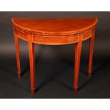 A George III rosewood crossbanded mahogany demi-lune card table,