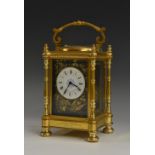 A 19th century Aesthetic Movement gilt brass repeating carriage clock, 5.