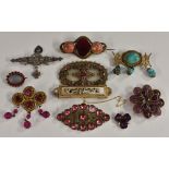 Brooches - a 19th century mother of pearl and rolled gold carved table brooch,