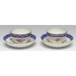 A Chelsea-Derby fluted tea bowl and saucer, painted in colourful enamels with scattered flowers,