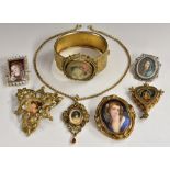 Jewellery - a continental silver painted Madonna brooch, blue robes, red smock, filigree frame,