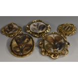 Brooches - a 19th century hair work mourning brooch, four feather hair work plume,