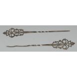 A pair of Spanish silver hair ornaments, the finials pierced with leafy scrolls, 16.