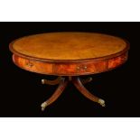 A George III Revival mahogany library or rent table,