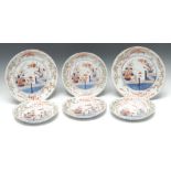 A Japanese part table service, comprising six shaped circular dishes in graduating sizes,