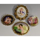 A continental porcelain oval painted panel brooch, Madonna and Child,