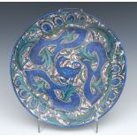 A John Pearson charger, painted with stylised birds and leafy scrolls,