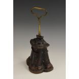 A Victorian cast iron and brass country house door stop, posted loop handle, fluted base, 29.