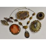 Jewellery - a 19th century banded agate oval panel brooch,