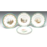 A pair of Minton shaped circular dessert plates, painted with Italianate landscapes, gilt borders,