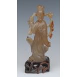 A Chinese agate figure, of a Guan Lin, standing by an oversize duck, pierced stand,