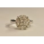 A diamond cluster ring,