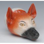 An English pottery novelty stirrup cup, modelled as a fox mask, naturalistically painted, 13cm long,