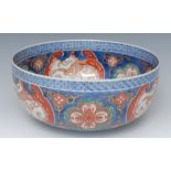 A Japanese Imari bowl, the interior with cobalt blue foliate roundel,