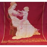 A Danish woollen wall hanging, embroidered depiction of mother and child on deep red ground,