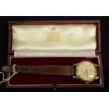 A gentleman's Zenith 9ct gold watch, presented for 25 years service in 1964,