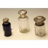 A Victorian Bristol blue glass scent bottle, silver top; two others,