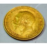 A George V gold half sovereign,