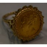 A gold sovereign, Victoria 1876, mounted as a signet ring in a 9ct gold,