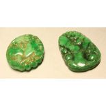 A jade coloured stone tablet/pendant;