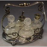 A Victorian EPNS Art Nouveau cut glass cruet set on stand, Mappin and Webb,