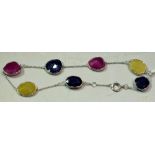 A multi coloured mixed gem stone bracelet,