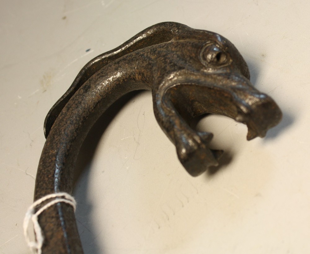 A pair of 19th century cast iron barley twist fire tongs, the handle modelled as a dragon, - Image 2 of 2