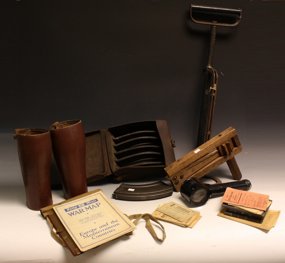 Militaria - a WWII magazine pouch with magazine; an ARP rattle; a pair of leather gaiters;