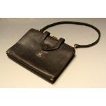 A leather handbag/writing case of small proportions, coin purse,