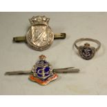 A Royal Navy silver and enamel sweetheart brooch; a similar silver ring;