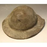 A late 19th/early 20th century shaped moulded leather mongers hat