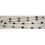 A contemporary modern design deep blue black stone inset white gold necklace,