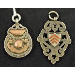 A gold and hallmarked silver football fob; a silver and enamel Gresley Rovers FC 1902 fob,