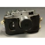 A vintage Zorki-4 SLR camera, serial no 69946935, with Jupiter 8 2/50 lens,