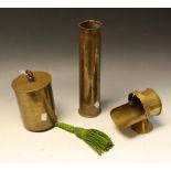 Trench Art - a WWI trench art bell, 1916; a miniature coal scuttle; an artillery shell,