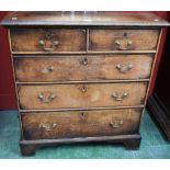 A George III oak chest,