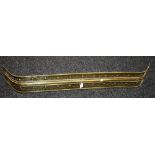 A 19th century pierced brass fire curb/fender,