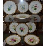 A Staffordshire dessert service, hand painted with floral sprays,