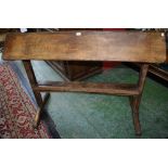 A Country estate made saddle/tack stand/rack, composed of two planks arranged as a pitch,