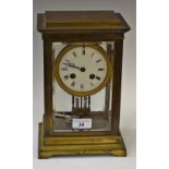 A late 19th century brass mantel clock, French movement, mercury pendulum,