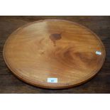 A 20th century mahogany lazy Susan, 47.