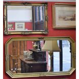 A gilt framed wall mirror, 70cm x 128cm; another, smaller,