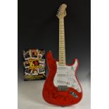 A Rockburn guitar signed by 1960s artists including Herman's Hermits, The swinging Blue Jeans,