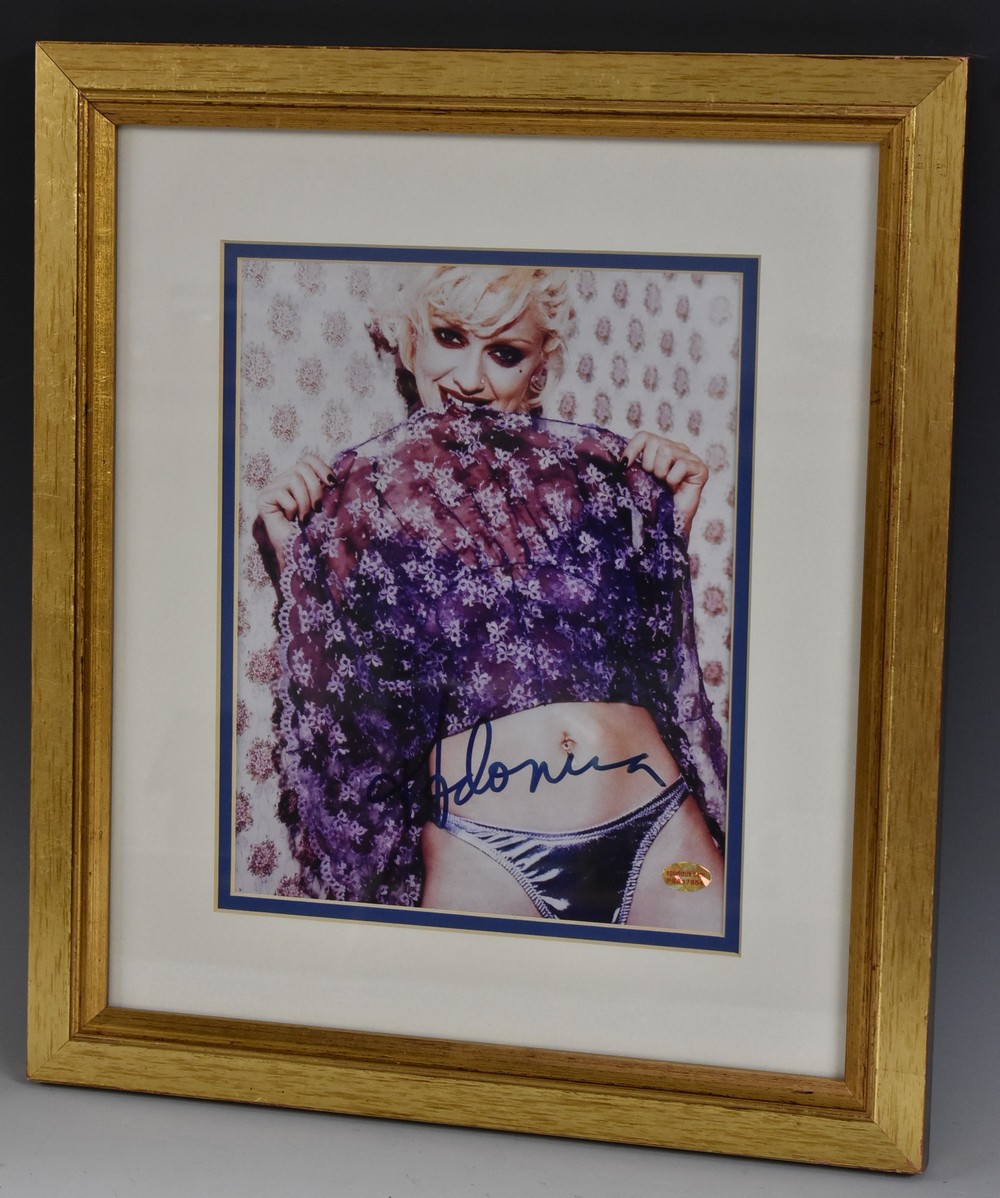 An autographed photographic image of Madonna, with Hamilton Bland certificate of authenticity,