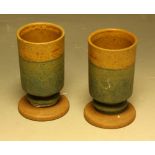 A pair of stoneware cylindrical toasting beakers, by Robin Welch Pottery,