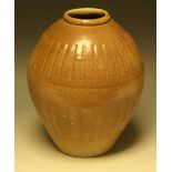 A reeded ovoid vase, attributed to Muriel Tudor-Jones, salt glazed in mottled brown throughout, 24.